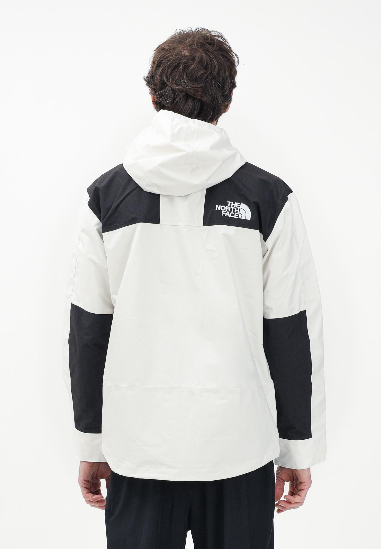THE NORTH FACE Giacca a vento Reign On bianca e nera da uomo NF0A8B5GROU1 . THE NORTH FACE 