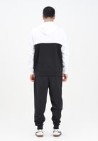 PUMA Tuta bianca e nera da uomo con logo 692158 01 PUMA 