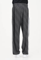 ADIDAS ORIGINALS Pantalone sportivo FIREBIRD LOOSE MONOGRAM nero da uomo KC9159 . ADIDAS ORIGINALS 