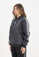 ADIDAS ORIGINALS Felpa con cappuccio Leo All Over Print Loose nera da donna JV7561  ADIDAS ORIGINALS 