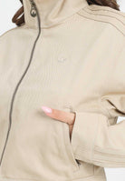 ADIDAS ORIGINALS Giubbotto Firebird Twill Crop in denim beige da donna JX7600 . ADIDAS ORIGINALS 