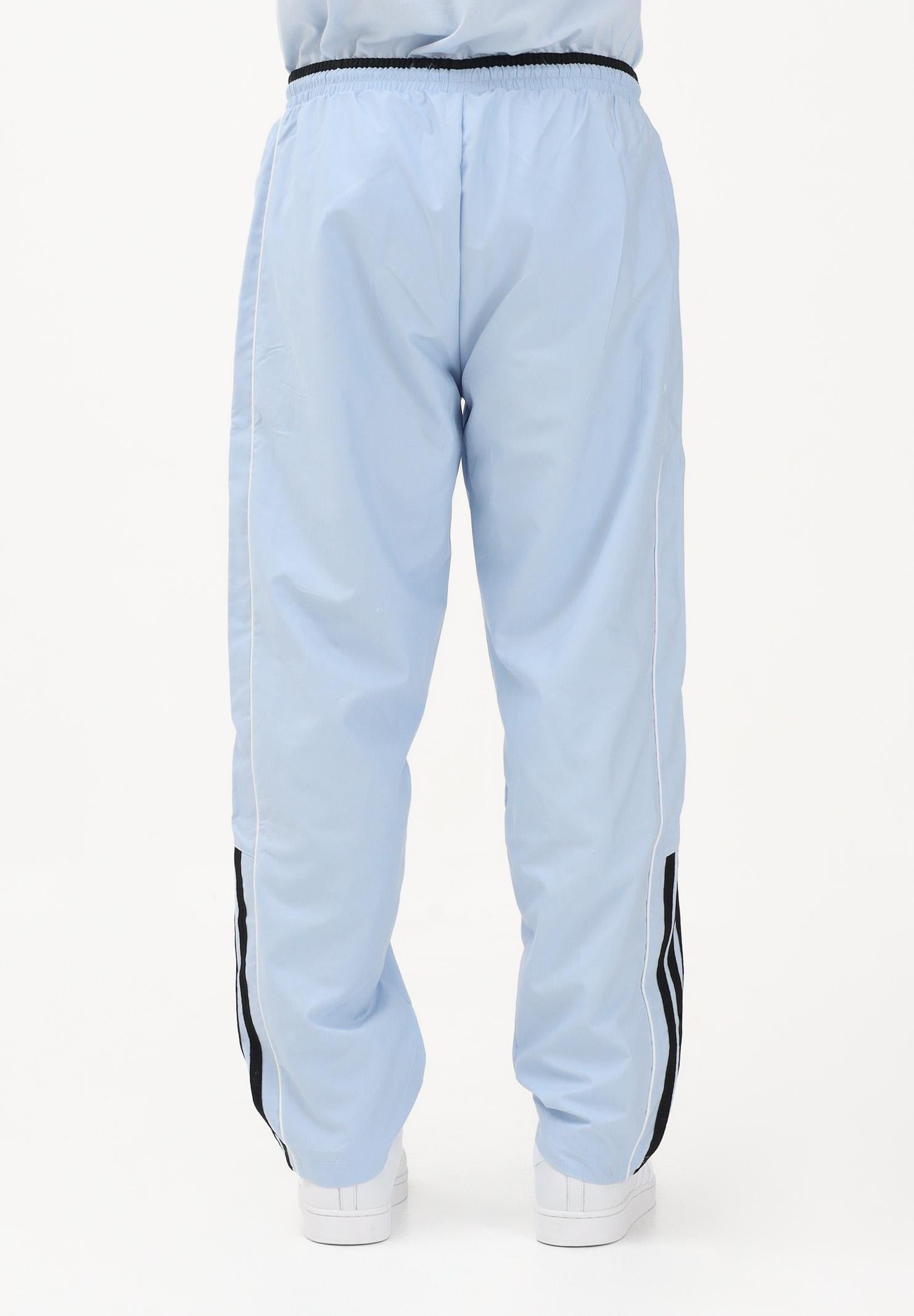 ADIDAS ORIGINALS Pantalone sportivo HALF STRIPES celeste da uomo KE2165 . ADIDAS ORIGINALS 