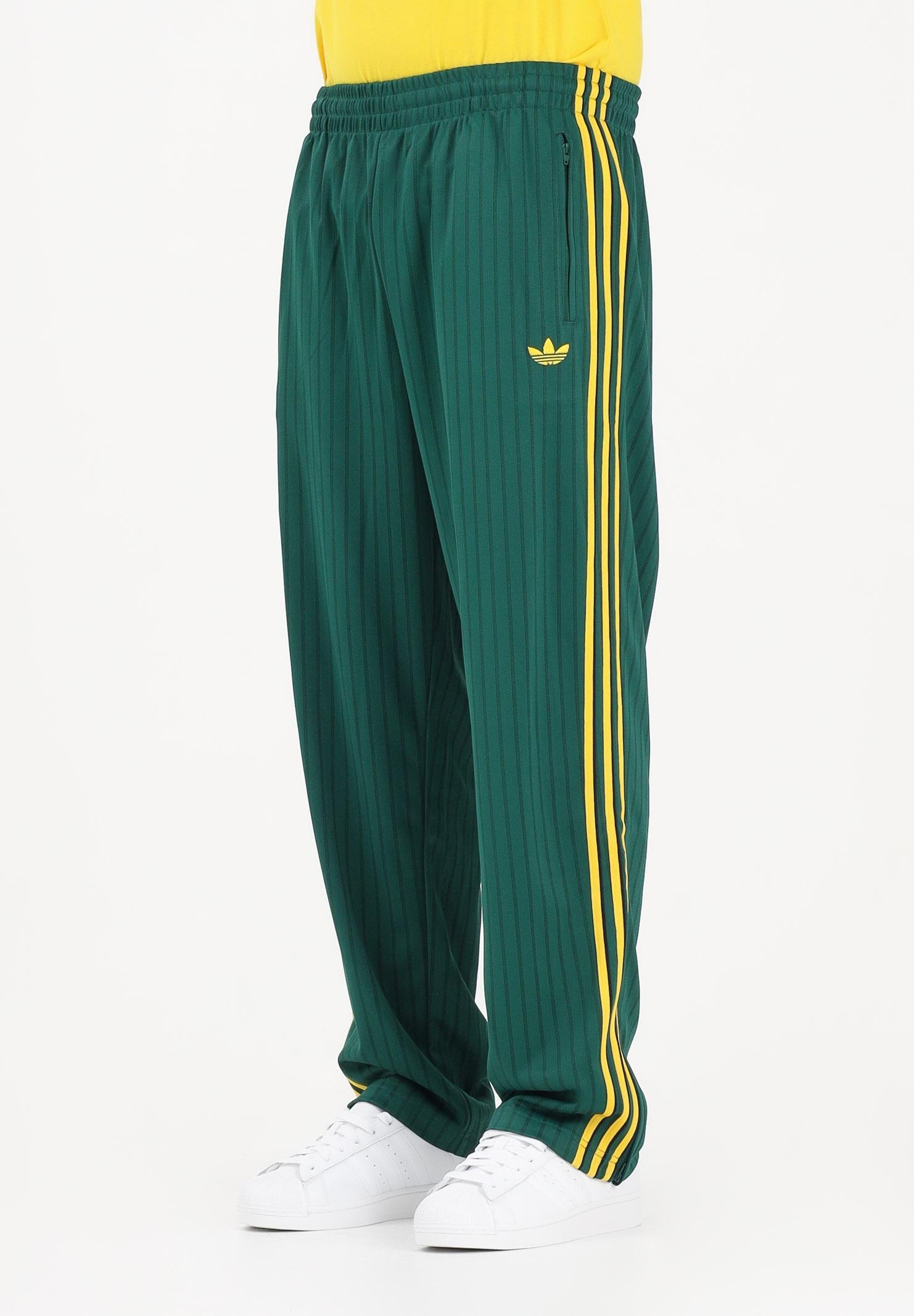 ADIDAS ORIGINALS Pantalone sportivo Firebird Loose Pinstripes verde e giallo da uomo KE3456 . ADIDAS ORIGINALS 