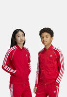 Felpa con zip adicolor SST rossa per bambino e bambina IX7629  ADIDAS ORIGINALS 