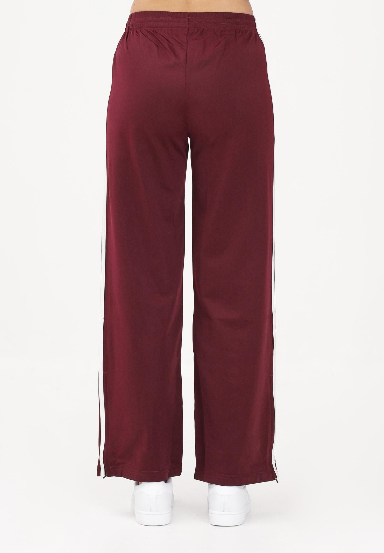 ADIDAS ORIGINALS Pantalone sportivo FIREBIRD LOOSE bordeaux da donna KD3659 . ADIDAS ORIGINALS 