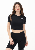 THE NORTH FACE T-shirt crop a manica corta nera da donna con logo NF0A55AOJK31 . THE NORTH FACE 