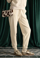 PUMA Pantalone sportivo HER panna da donna 688154 87 PUMA 