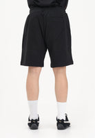 TOMMY HILFIGER Shorts sportivo nero da uomo con banda laterale logata MW0MW42883 BDS TOMMY HILFIGER 