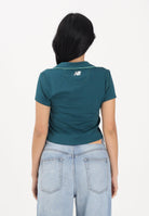 NEW BALANCE Polo a manica corta ottanio da donna WT61S8TLAAV . NEW BALANCE 