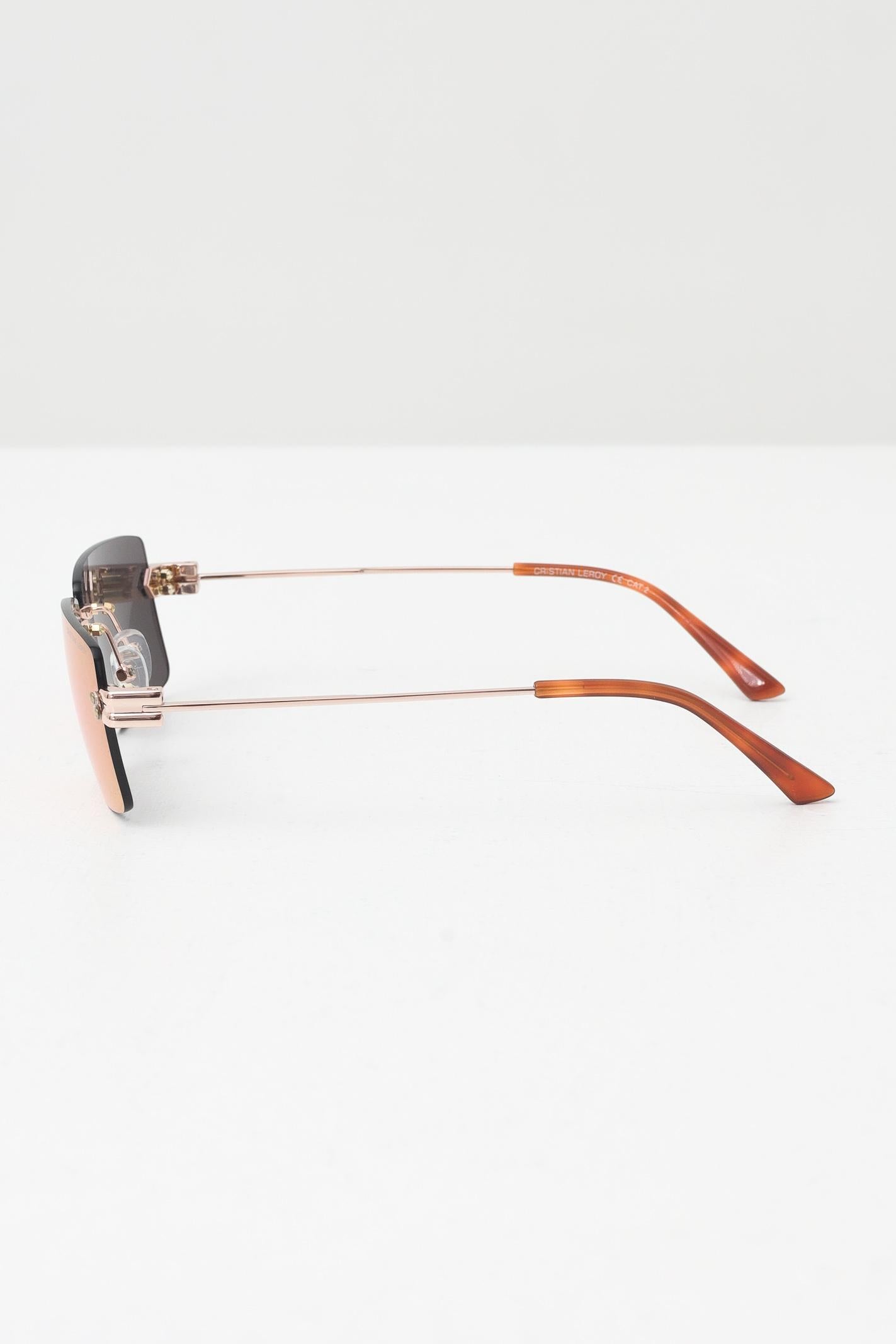 CRISTIAN LEROY Occhiali da sole per uomo e donna con lenti con riflessi iridescenti  e montatura rimless 15047 04 CRISTIAN LEROY 