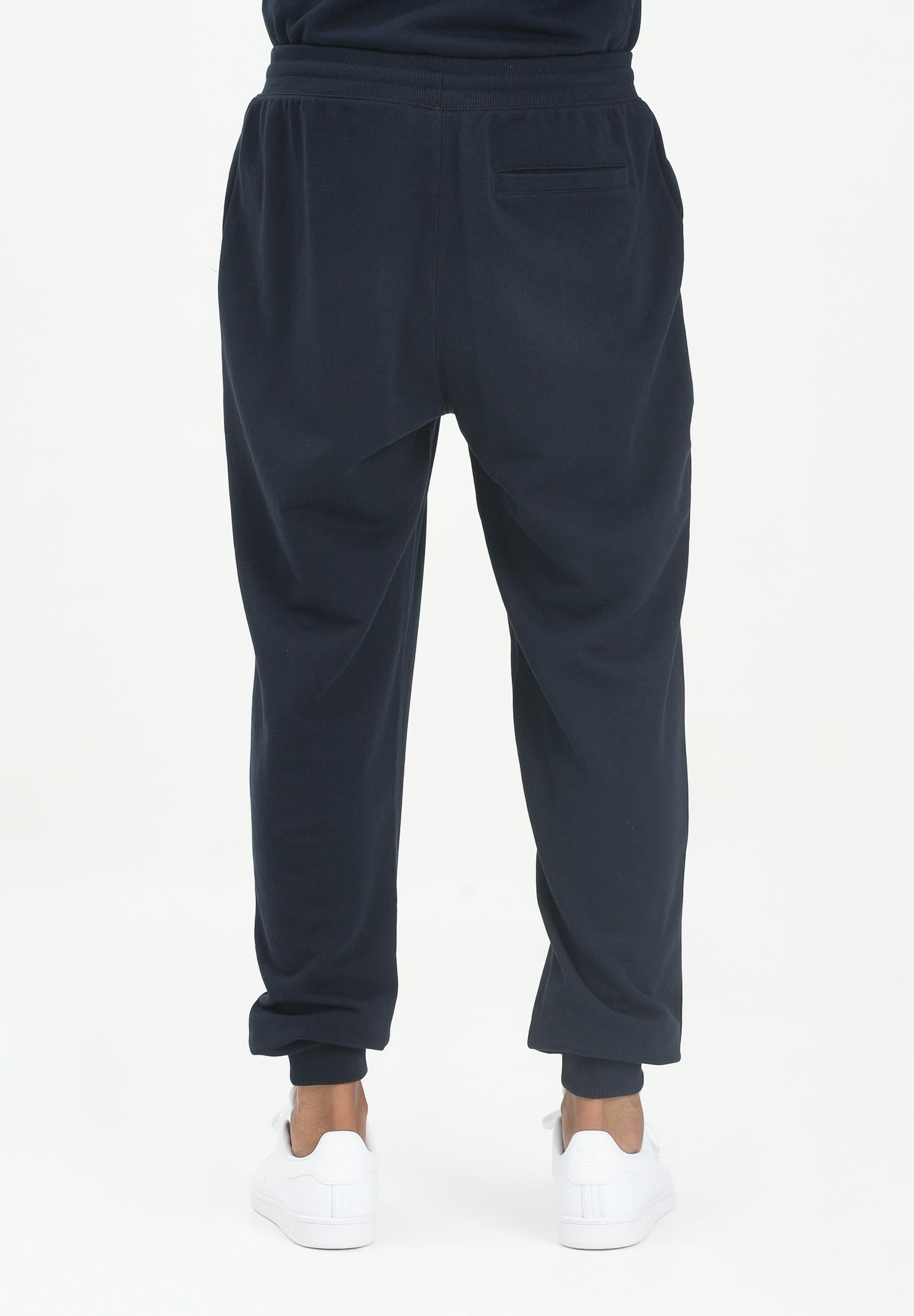 TOMMY HILFIGER Pantalone sportivo blu da uomo con ricamo logo MW0MW37236DW5 . TOMMY HILFIGER 