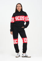 GCDS Pantalone sportivo nero per donna, ragazzi e bambini con fascia a contrasto e logo B2JU3017BA2 99 GCDS 