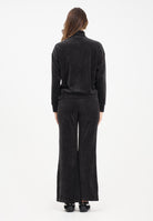 PUMA Tuta sportiva nera da donna realizzata in velluto a costine 688164 01 PUMA 