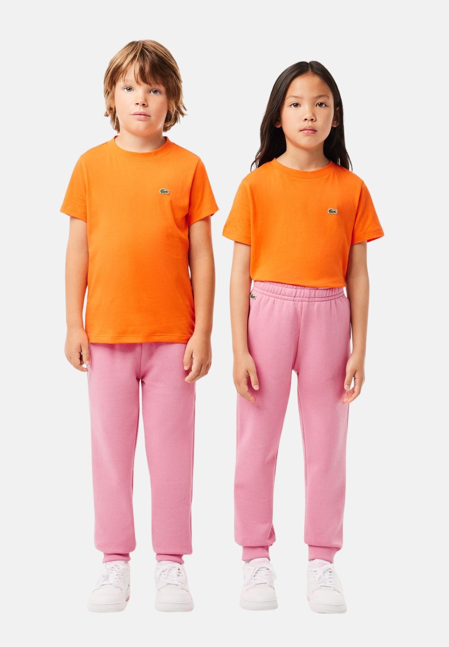 Pantalone sportivo rosa per bambino e bambina rifinito da ricamo coccodrillo XJ9728-J 2R3 LACOSTE 