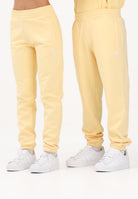 ADIDAS ORIGINALS Pantalone sportivo TREFOIL ESSENTIALS giallo per uomo e donna KE1159 . ADIDAS ORIGINALS 