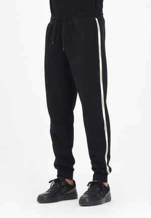EA7 Pantalone sportivo nero da uomo con bande laterali logate 7M000974AF10377 UC001 EA7 