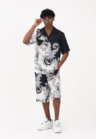 VERSACE JEANS COUTURE Shorts nero da uomo con stampa Wave Couture 80GAD10BNS787 V22 VERSACE JEANS COUTURE 