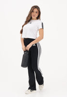 ADIDAS PERFORMANCE Leggings sportivo Optimé Essentials 3-Stripes Flared nero da donna JD6544 . ADIDAS PERFORMANCE 