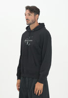 CALVIN KLEIN JEANS Felpa con cappuccio nera da uomo caratterizzata da maxi stampa logo LV04RC282GUB1  CALVIN KLEIN JEANS 
