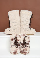 MOON BOOT Stivali da neve ICON LOW CURLY beige da donna con stampa cow 80D1409690 MM04 MOON BOOT 