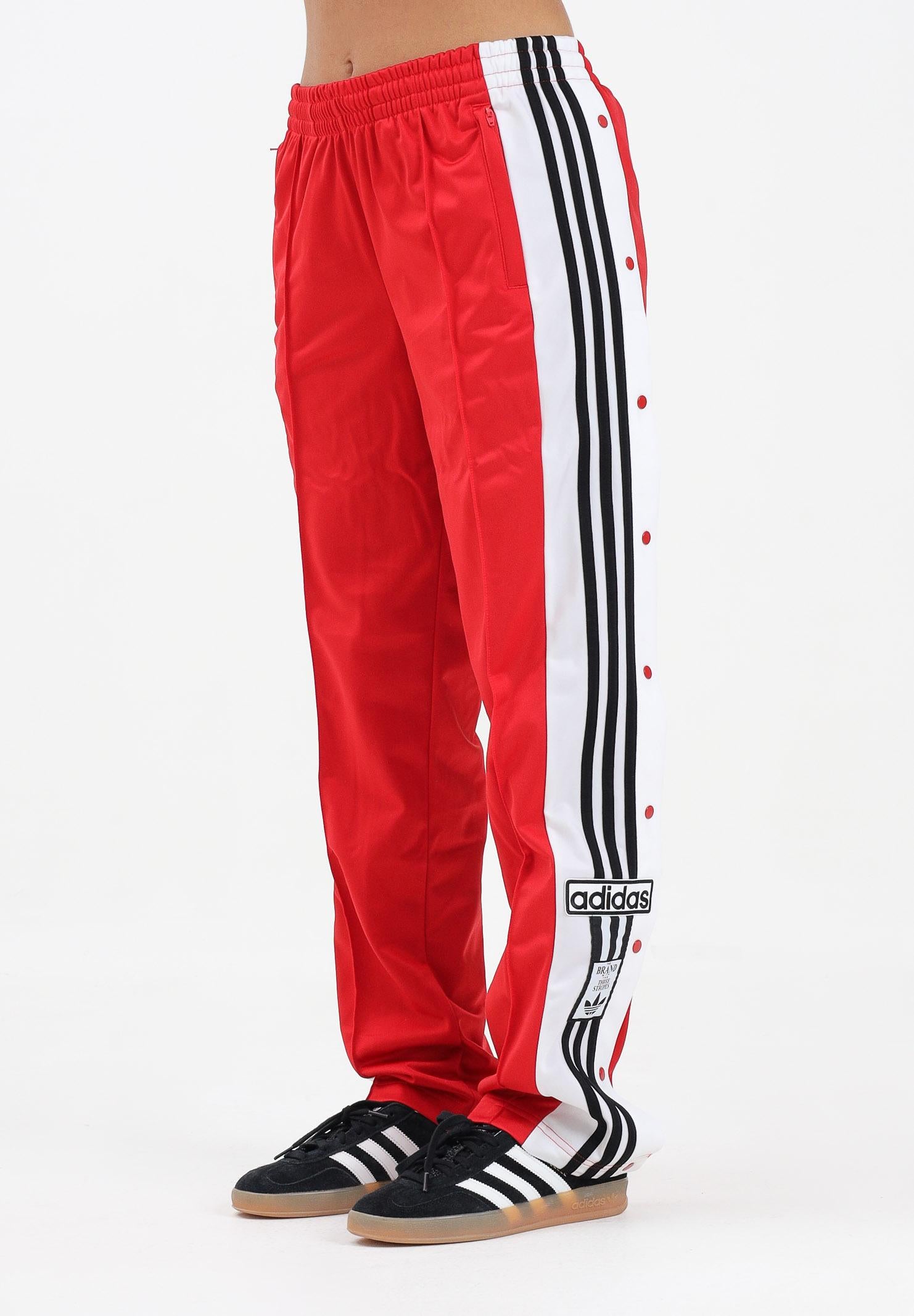 ADIDAS ORIGINALS Pantalone sportivo Adibreak rosso da donna JY1354 . ADIDAS ORIGINALS 
