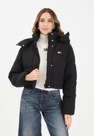 TOMMY JEANS Piumino nero da donna con logo DW0DW21624BDS  TOMMY JEANS 
