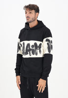 DISCLAIMER Felpa con cappuccio nera da uomo rifinita da inserto panna con logo 25IDS55362 NELA DISCLAIMER 