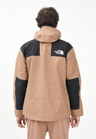 THE NORTH FACE Giacca a vento Reign On marrone e nera da uomo NF0A8B5G58W1  THE NORTH FACE 