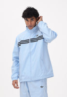ADIDAS ORIGINALS Giacca a vento CHEST STRIPES celeste da uomo KE2164 . ADIDAS ORIGINALS 