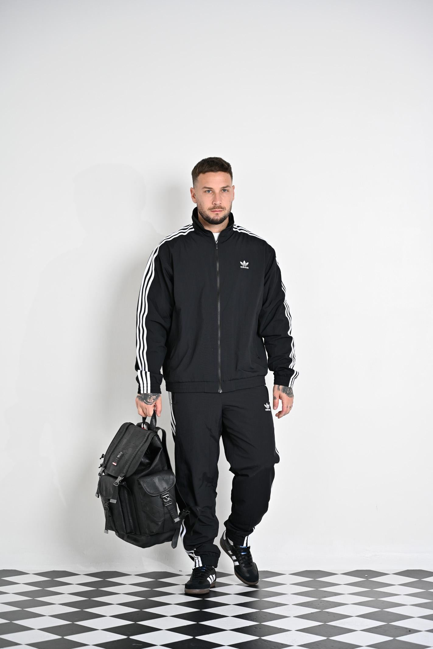 ADIDAS ORIGINALS Giacca a vento Adicolor Woven Firebird nera da uomo IT2491 . ADIDAS ORIGINALS 