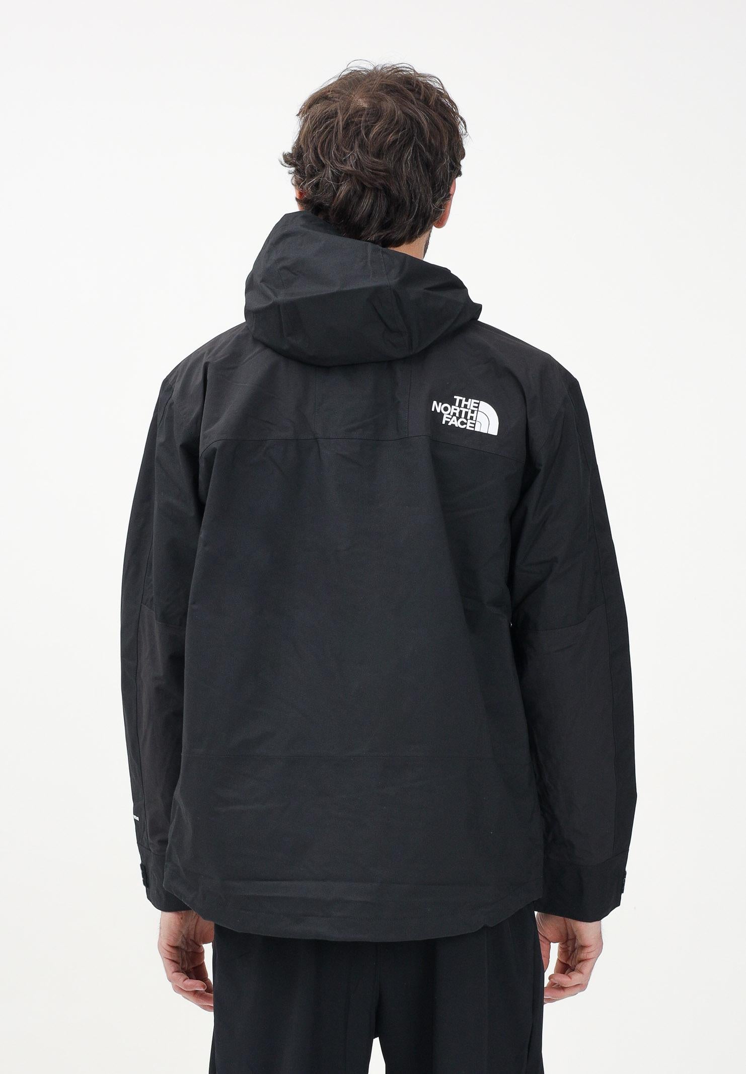 THE NORTH FACE Giacca a vento Reign On nera da uomo NF0A8B5GJK31 . THE NORTH FACE 