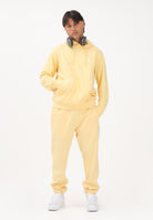 ADIDAS ORIGINALS Pantalone sportivo TREFOIL ESSENTIALS giallo per uomo e donna KE1159 . ADIDAS ORIGINALS 