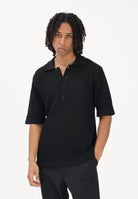 I'M BIRAN Polo nera da uomo in tessuto lavorato a maglia traforata MA3604 009 I'M BRIAN 
