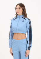 ADIDAS ORIGINALS Giacca a vento Teamgeist adicolor Cropped azzurra da donna JZ8277  ADIDAS ORIGINALS 