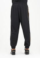 EA7 Pantalone sportivo nero da uomo con bande laterali e logo 7M000622AF17089 UC001 EA7 