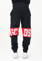 GCDS Pantalone sportivo nero per uomo e donna con banda logo Z0MLQI209F004 999R GCDS 