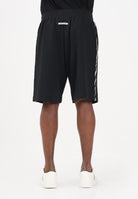 EA7 Shorts sportivo nero da uomo con bande logate laterali 7M001481AF12660 UC001 EA7 