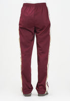ADIDAS ORIGINALS Pantalone sportivo Adibreak bordeaux da donna KA7732 . ADIDAS ORIGINALS 