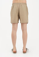 NIKE Shorts mare beige da uomo con logo NESSF560 241 NIKE 