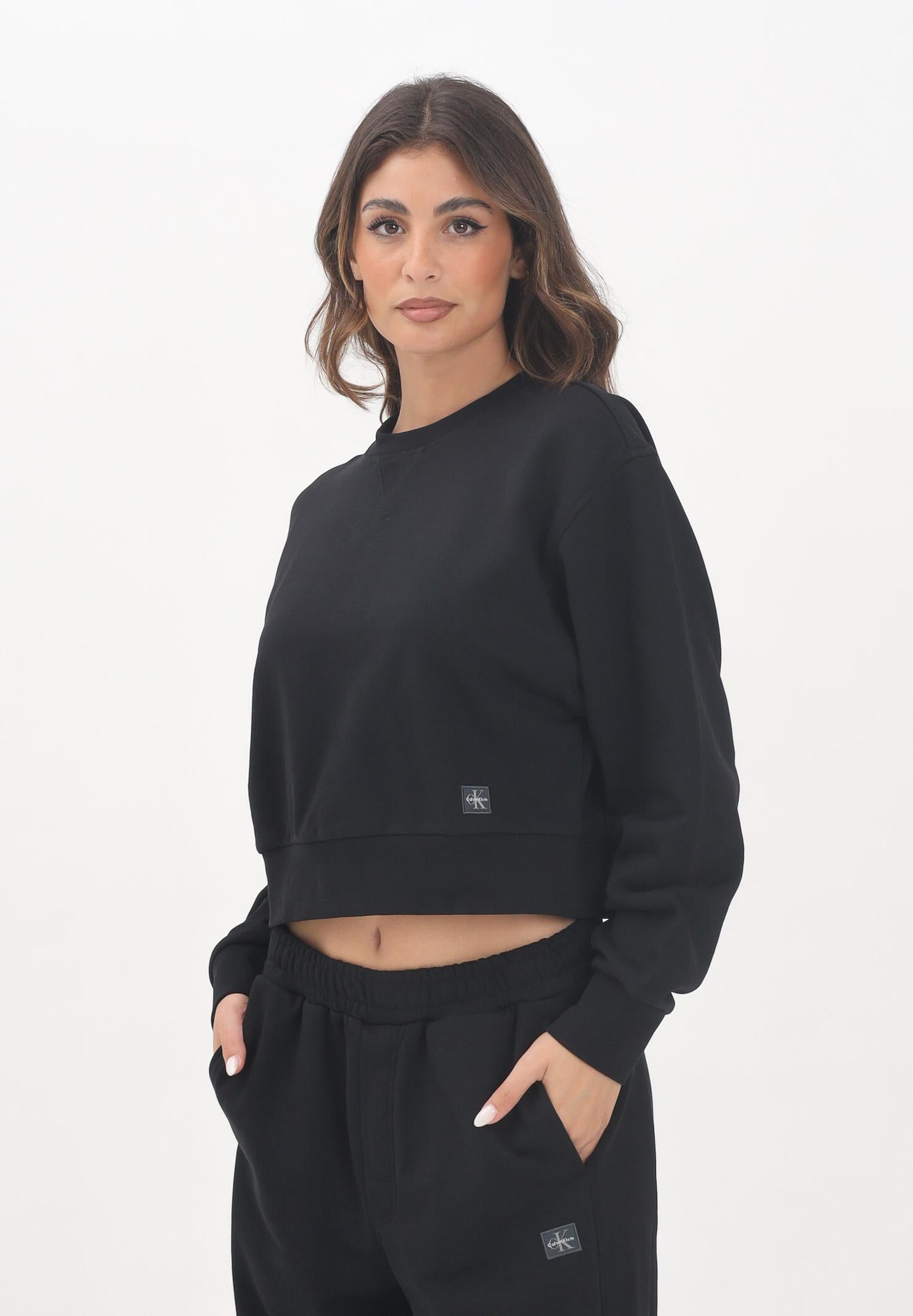 CALVIN KLEIN JEANS Felpa girocollo nera da donna con patch logo LV047C911GUB1  CALVIN KLEIN JEANS 