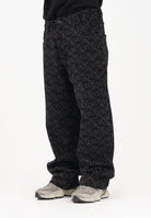 ARMANI EXCHANGE Jeans baggy nero da uomo con logo all-over XM000076AF18821 FC145 ARMANI EXCHANGE 