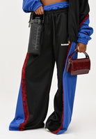 BARROW Pantalone sportivo nero da donna con bande laterali blu elettrico e inserti in pizzo rosso F5BWWOPA108 110 BARROW 