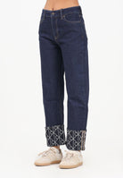 CALVIN KLEIN JEANS Jeans in denim blu da donna con risvolto logato LV047D711GZ1H . CALVIN KLEIN JEANS 