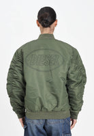 DIESEL Bomber verde militare per donna, ragazzi e bambini con maxi logo Oval Diesel J023980KAUX K513 DIESEL 