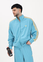 ADIDAS ORIGINALS Felpa con zip Firebird azzurra da uomo KE1642 . ADIDAS ORIGINALS 