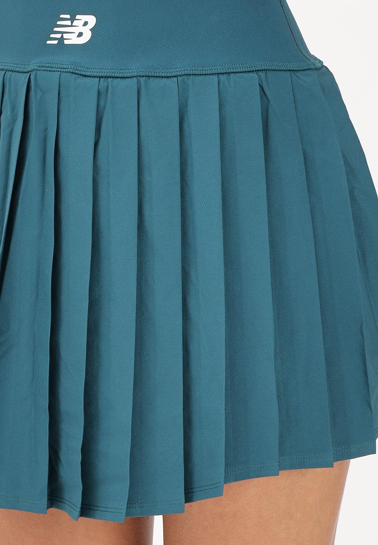 NEW BALANCE Gonna corta Tournament verde da donna WB61P32UAAV . NEW BALANCE 