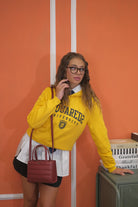 Felpa con cappuccio gialla per donna e bambina rifinita da logo stile college DQ2466D0094 DQ201 DSQUARED2 