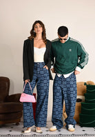 ADIDAS ORIGINALS Jeans Monogram All Over Print in denim medio da uomo JY2993 . ADIDAS ORIGINALS 