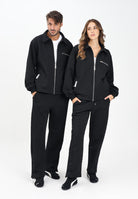 GCDS Pantalone sportivo nero per uomo e donna con lavorazione jacquard del logo B2CM3010TQ6 99 GCDS 