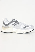 NEW BALANCE Sneakers 9060 grigie per uomo e donna GC9060GY . NEW BALANCE 